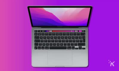 apple macbook pro 13 m2 on purple background