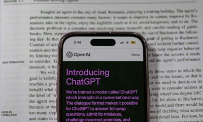 ChatGPT on phone in front of text