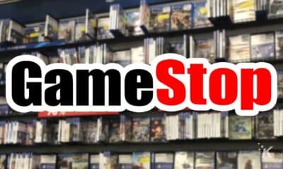 gamestop logo with games in the background