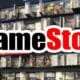 gamestop logo with games in the background