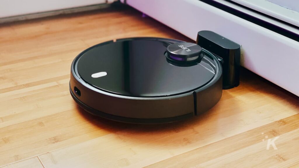 image of a iLife A11 robot vacuum cleaner on hardwood floor