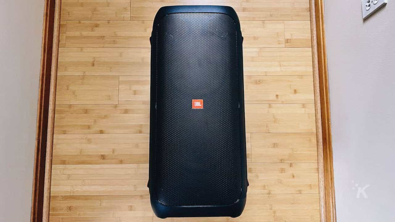A black case filled with accessories sits indoors.