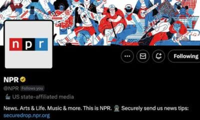 This image is showing that NPR is a US state-affiliated media source that provides news, arts & life, music, and more, and is inviting people to securely send news tips to them. Full Text: LIVE OG ECONOMY BREAKING npr + 1 ... Following NPR @NPR Follows you US state-affiliated media News. Arts & Life. Music & more. This is NPR. Securely send us news tips: securedrop.npr.org