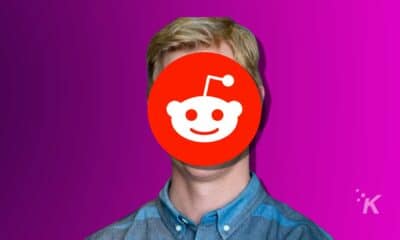 reddit ceo A person is wearing a reddit logo mask.