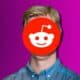 reddit ceo A person is wearing a reddit logo mask.