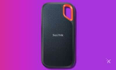 sandisk portable ssd drive on a purple background