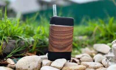 Angus portable vaporizer by YLLVAPE outdoors by rocks