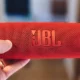 JBL Flip 6 portable speaker red in hand