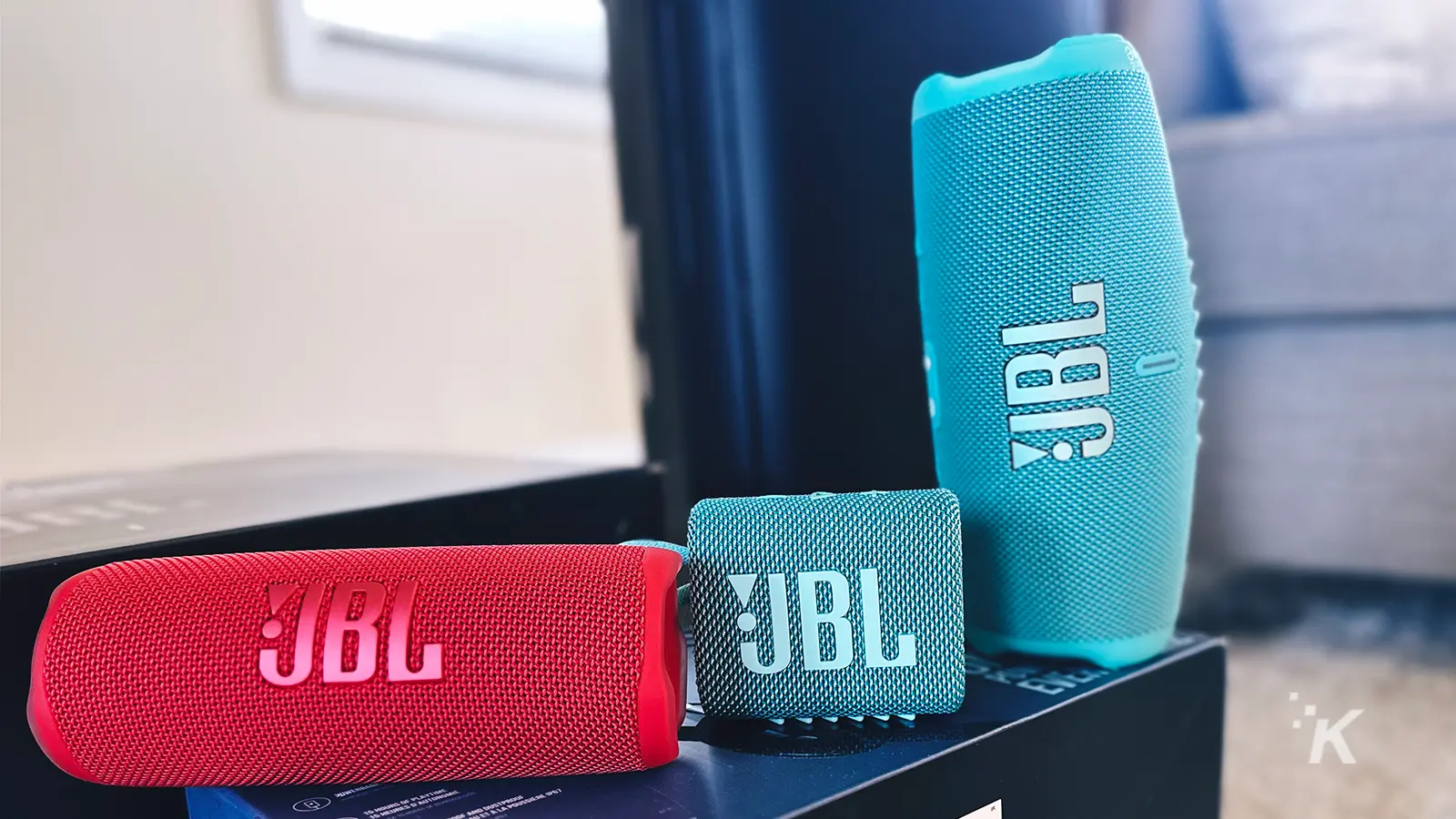 JBL portable speakers on a box