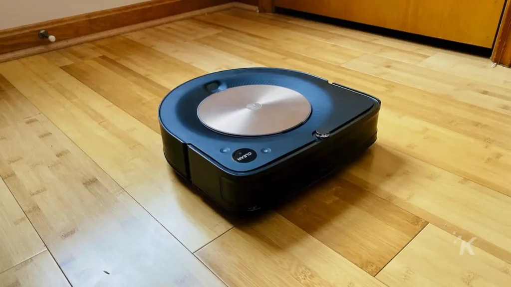 roomba s9 robot vacuum on a hardwood floor